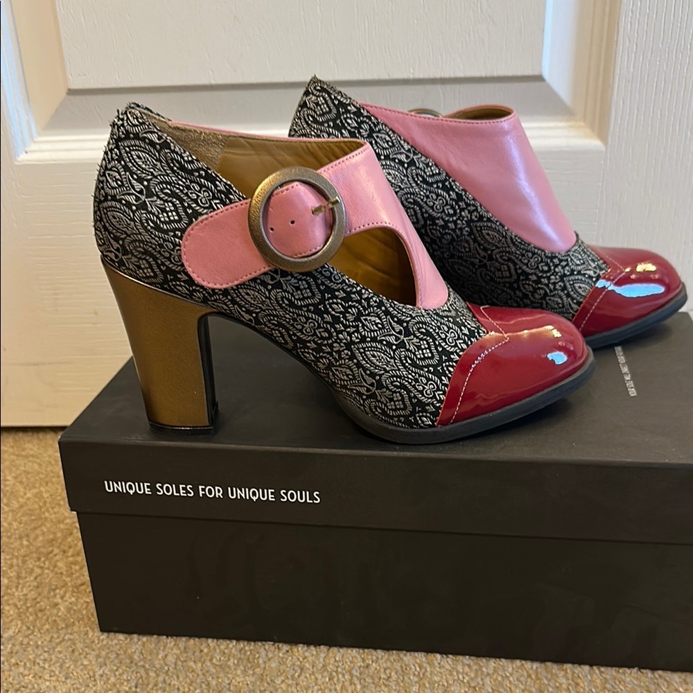 Wear some art with Stylish John Fluevog Women's Heels with Pink and Red Accents